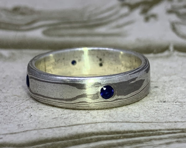 Mokume Gane Band -with blue sapphires, 14k palladium white gold and sterling